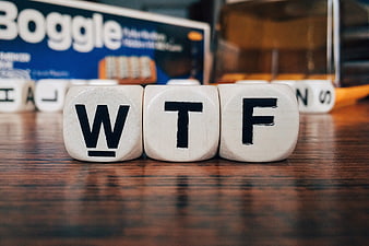 WTF Acronym Spelled Out With Wooden Letter Tiles On Table