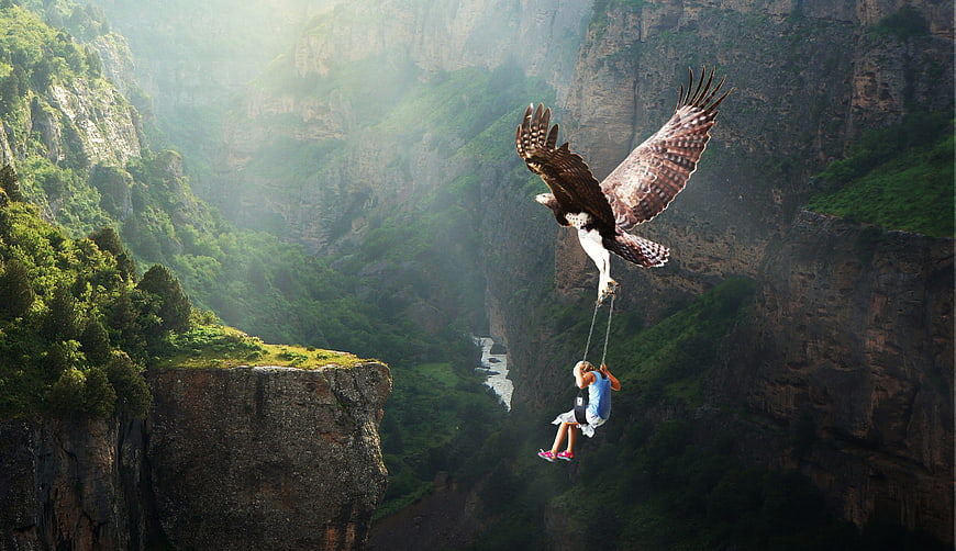 Woman Flying Through Canyon With Giant Eagle