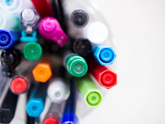 Top View of Colorful Markers in a Jar with White Copyspace