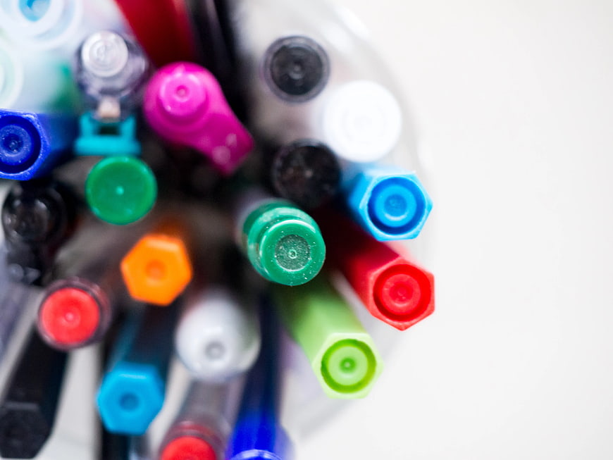 Top View of Colorful Markers in a Jar with White Copyspace