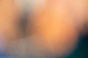 Abstract Blurred Background with Warm Orange and Soft Blue Tones