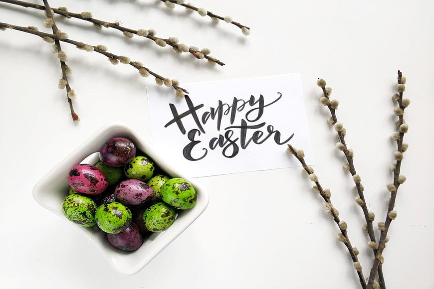 Happy Easter card with colorful eggs and pussy willow branches