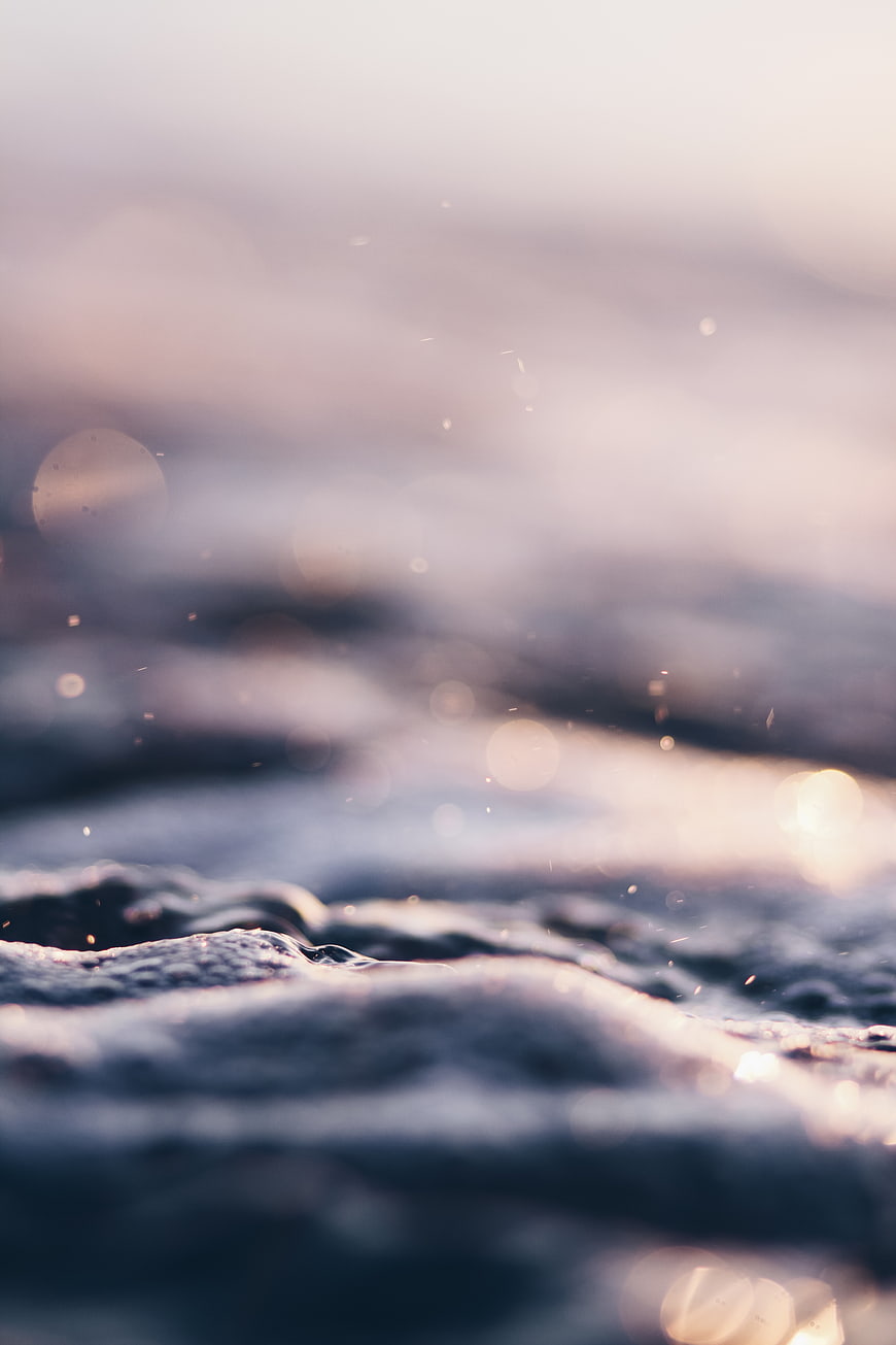 Abstract Ocean Waves with Soft Bokeh and Golden Light