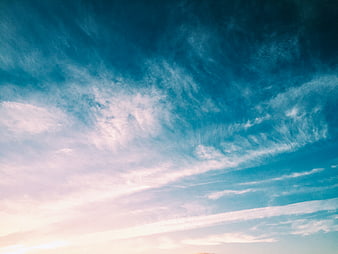 Dramatic Blue Sky with Wispy Clouds at Sunset