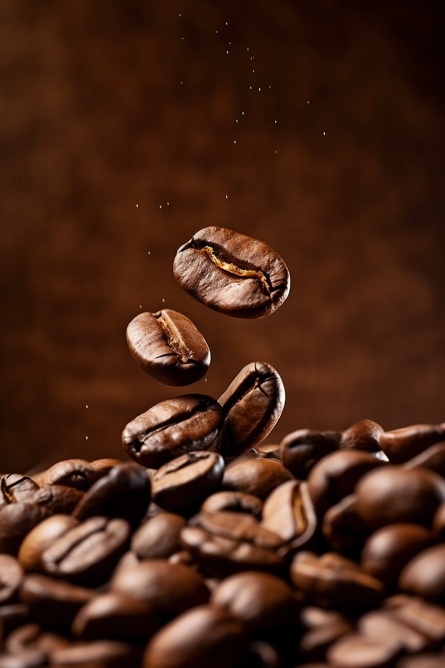 Roasted coffee beans falling in slow motion