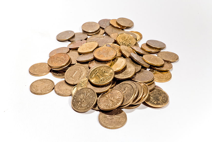 Pile of Gold Coins on White Background