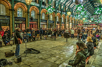 Street musician performing at Covent Garden market in London