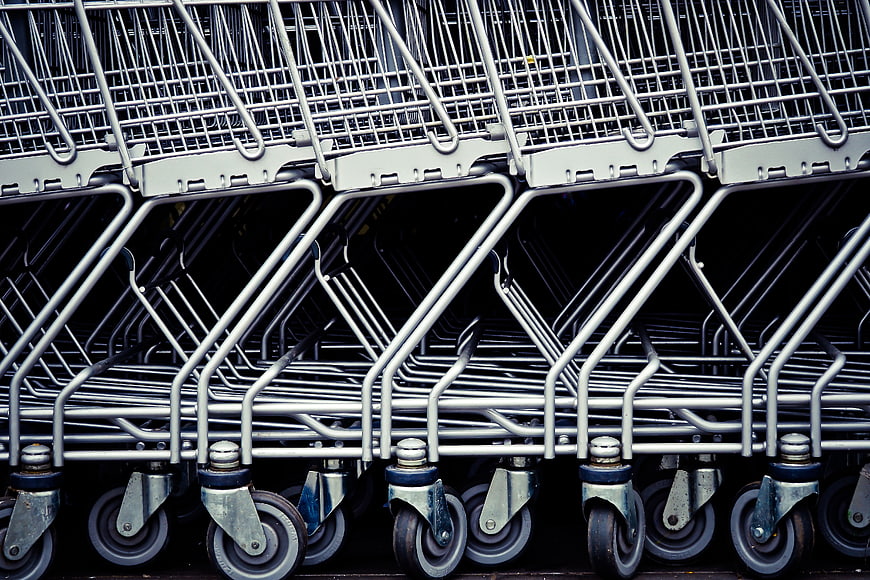 Row of Nested Metal Shopping Carts