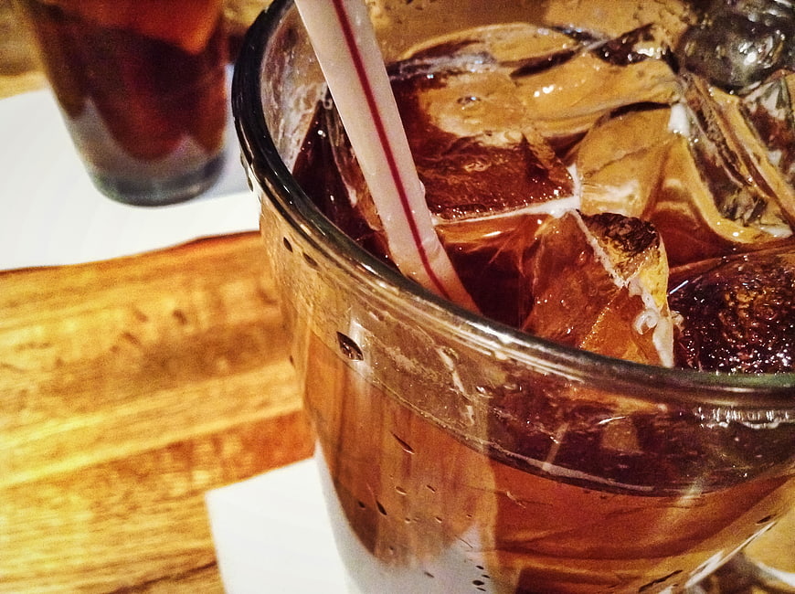Close-up of Iced Coffee with Straw in Glass