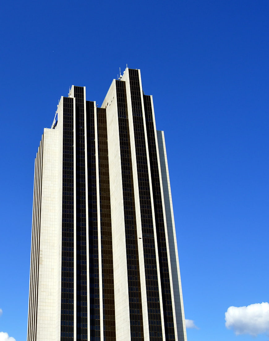 Tall modern skyscraper against clear blue sky