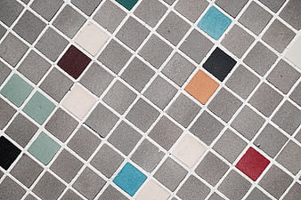 Gray mosaic tile pattern with colorful accents