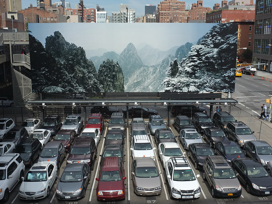 Large Mountain Mural Above Urban Parking Garage