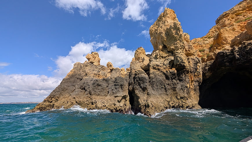 Dramatic coastal cliffs and turquoise ocean waves