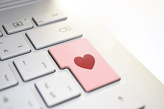 Pink Enter Key With Red Heart On White Laptop Keyboard