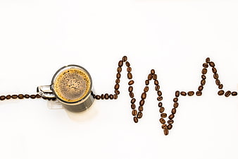 Coffee Cup and Beans Forming Heartbeat Line on White