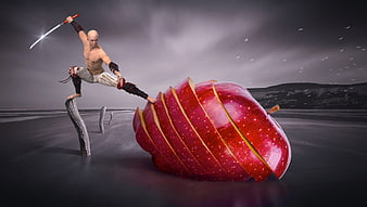 Surreal warrior slicing giant red apple on beach