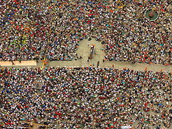 Aerial View of Massive Public Gathering in Urban Square