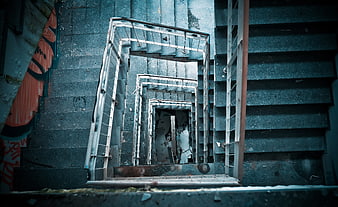 Abstract Concrete Spiral Staircase in Abandoned Building