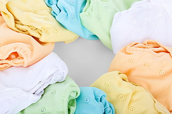 Pastel reusable drawstring bags arranged in a circle