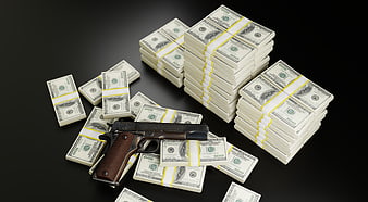 Pistol and Stacks of Cash on Black Background
