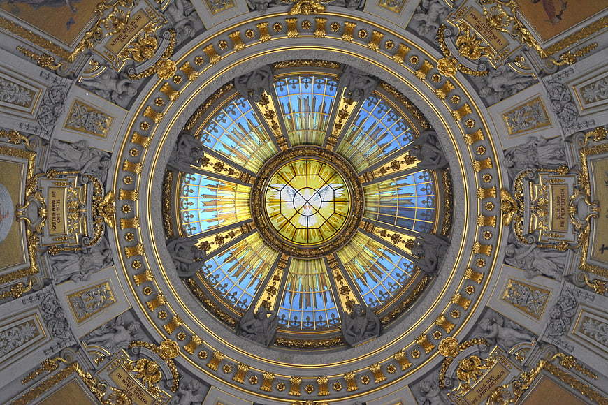 Ornate Cathedral Dome Ceiling with Stained Glass and Gold Details