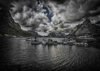 Dramatic HDR Fishing Boats in Lofoten Harbor Under Stormy Sky