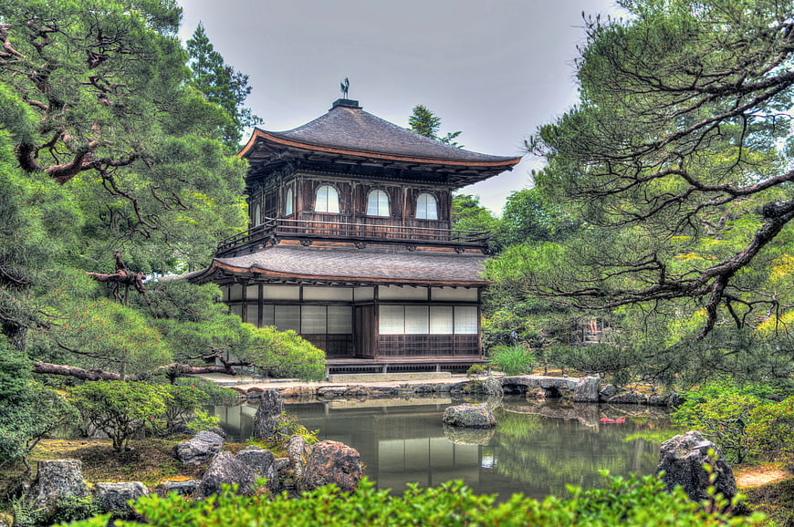 Traditional Japanese Temple Pavilion in Serene Garden Pond