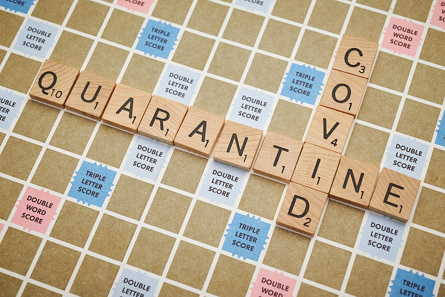 Quarantine Word on Scrabble Board Game Tiles