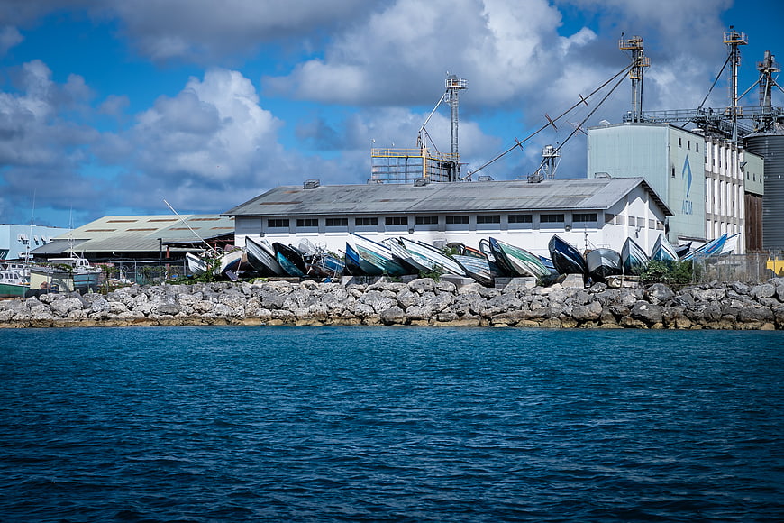 Industrial Barbados Shoreline with Boats and Factory