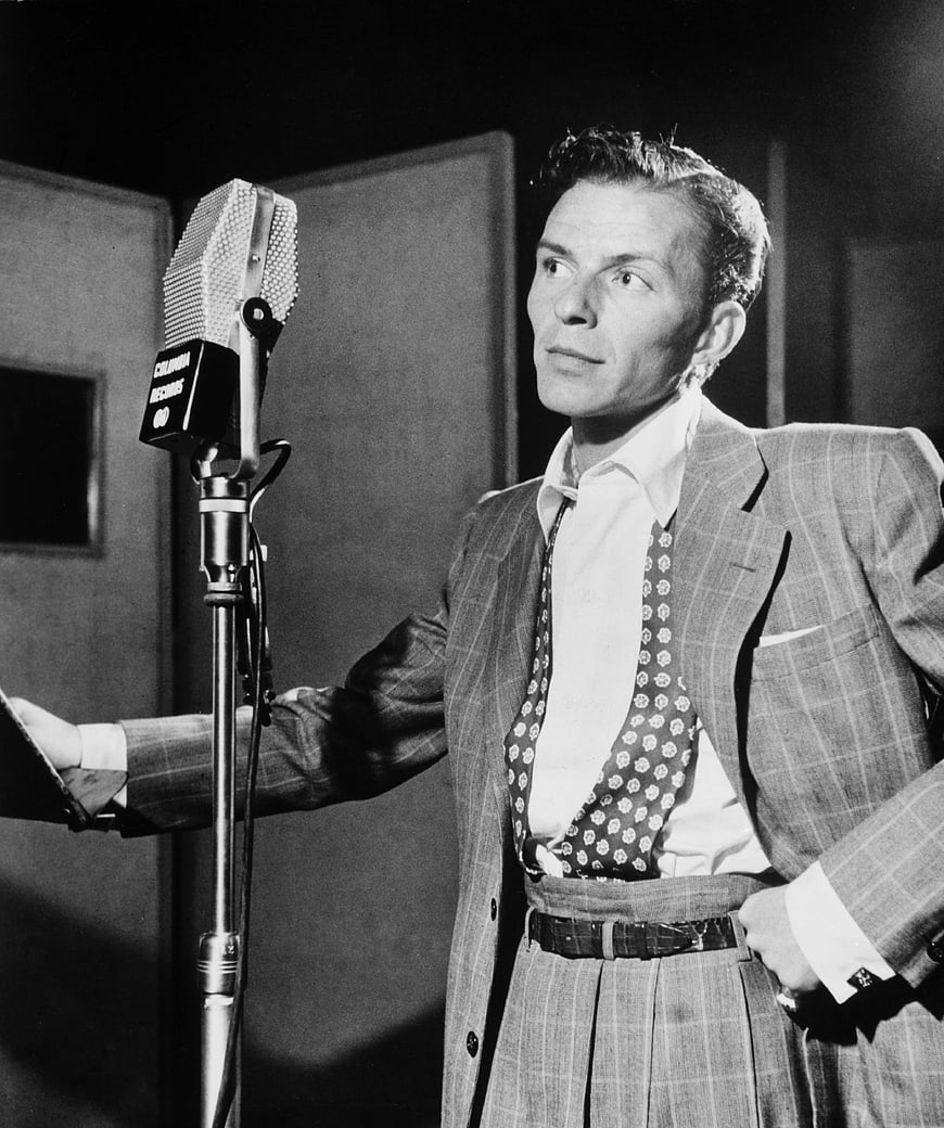 Vintage black and white portrait of Frank Sinatra singing