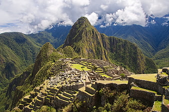 Machu Picchu ruins with Huayna Picchu mountain peak