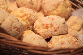 Close-up of Traditional Brazilian Cheese Bread in a Wicker Basket