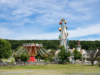 Amusement Park with Ferris Wheel and Swing Ride