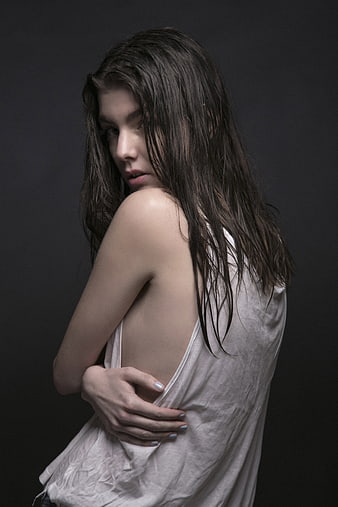 Moody Studio Portrait of Young Woman in White Top