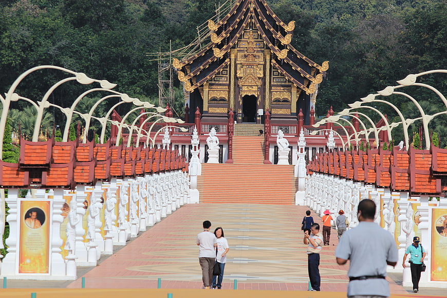 Grand Thai Temple with Golden Roof and White Statues