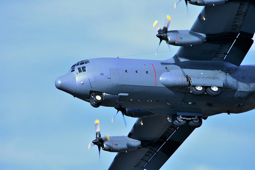 Military Transport Aircraft in Flight with Landing Gear Down