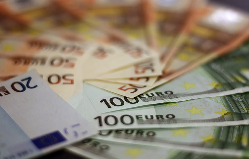 Close-up of assorted Euro banknotes including 20, 50, and 100 Euro bills
