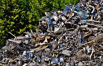 Pile of scrap metal and industrial waste for recycling