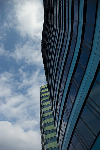 Low Angle View of Modern Glass Skyscraper