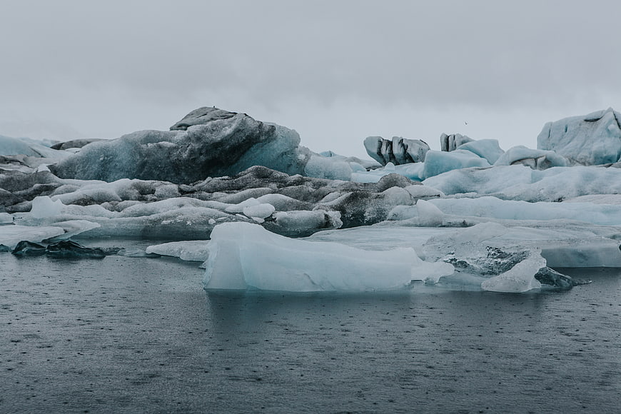 Glacial Icebergs Floating in Cold Arctic Waters