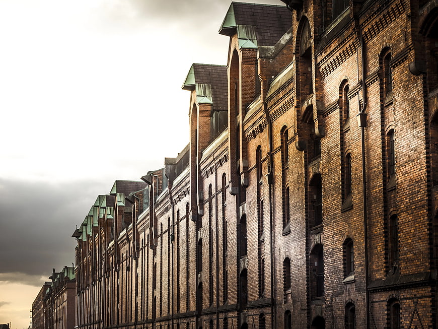 Low-angle view of historic brick warehouse buildings