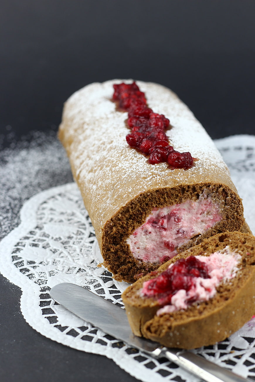Chocolate Sponge Cake Roulade With Cream And Cranberry Filling