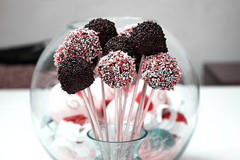 Chocolate Cake Pops with Sprinkles in Glass Bowl