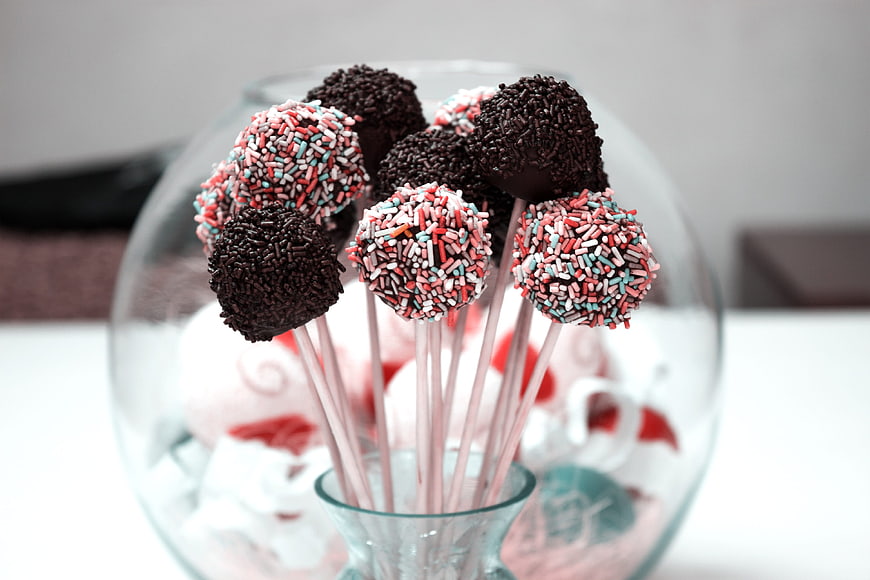 Chocolate Cake Pops with Sprinkles in Glass Bowl