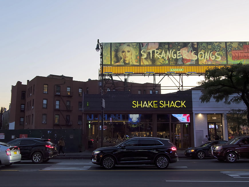 Shake Shack Restaurant with Billboard in Brooklyn at Sunset