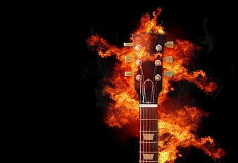 Flaming Guitar Headstock Close-Up on Black Background