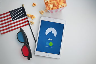 VPN tablet with popcorn, 3D glasses, and US flag
