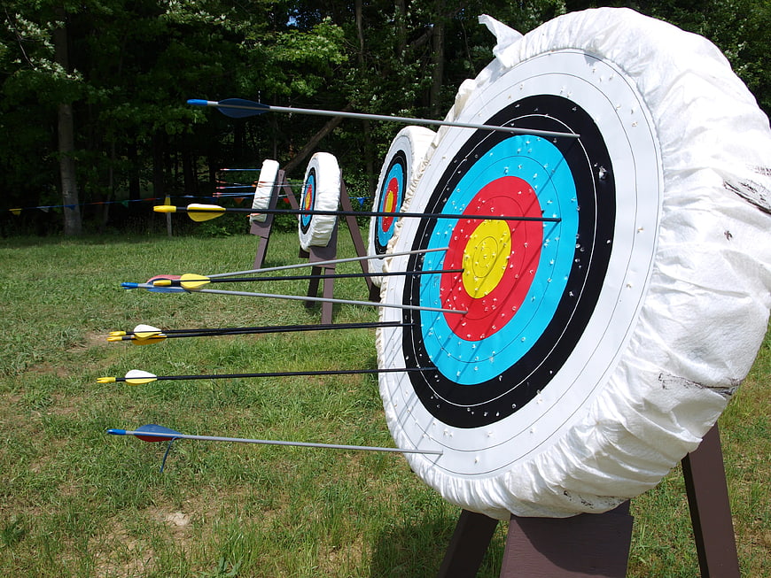 Arrows stuck in archery target outdoors