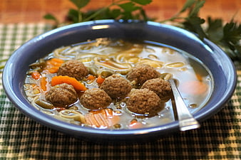 Traditional Czech Meatball Soup With Noodles And Vegetables In Blue Bowl