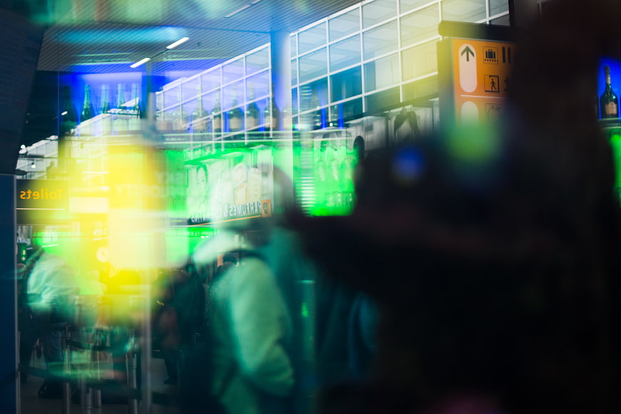 Abstract motion blur of travelers in airport terminal